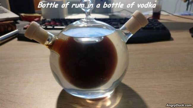 Bottle Of Rum Inside Of Bottle Of Vodka