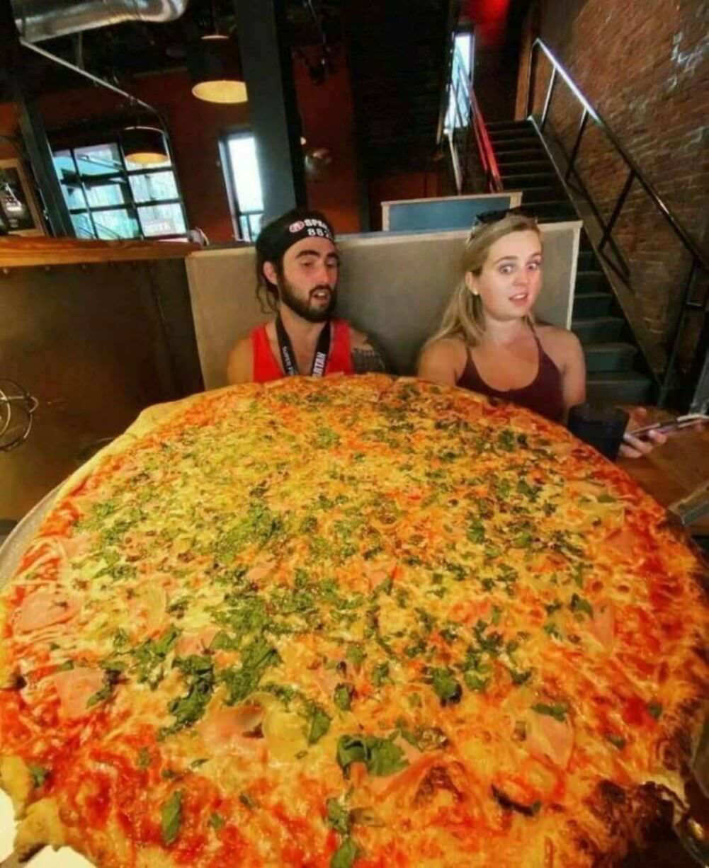 that is a huge pizza